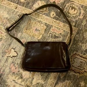 Coach leather messenger bag.  Brown leather with canvas strap. EUC.